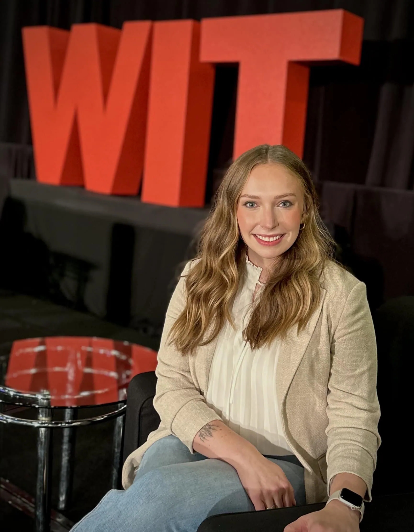 A woman smiling for a picture