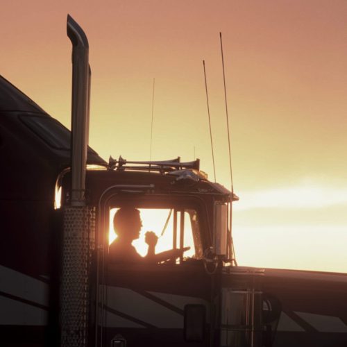 a-silhouette-of-a-truck-driver-on-his-cb-radio-in-2023-11-27-04-53-40-utc-w1080-h1920